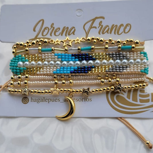 Set de pulseras azul con perlas